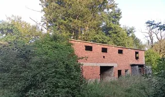 Zdjęcie opuszczonego miejsca: Opuszczony dom w cisku
